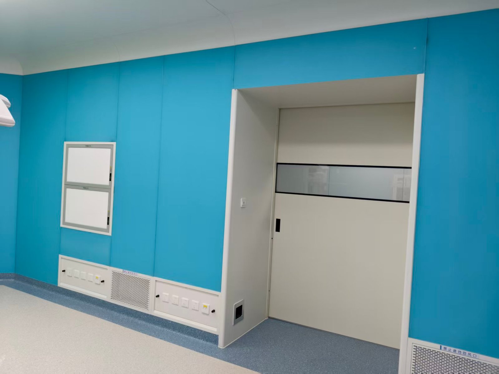 Operating room wall panels and door opening